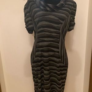 Evan-Picone size 14, like new. Doesn’t fit me well anymore sadly. Beautiful on!